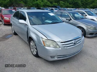 2006 Toyota Avalon XL with VIN 4T1BK36B86U127735, listed as a IAAI auction lot 42112001 with 173,861 mi miles. Bid and sale history available at carsss.com. Image 1.