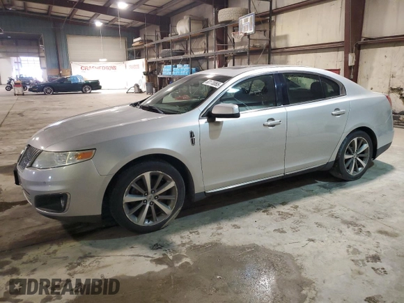 2009 Lincoln MKS z VIN 1LNHM93R89G613358, wystawiony jako Copart lot #60170065 z przebiegiem 171 803 mil mil oraz Czysty tytuł • Clean title. Historia ofert i sprzedaży dostępna na DreamBid. Obrazek 1.