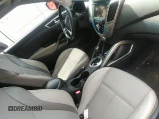 2013 Hyundai Veloster w/Black Int with VIN KMHTC6AD5DU097618, listed as a IAAI auction lot 41876394 with 159,519 mi miles. Bid and sale history available at carsss.com. Image 5.