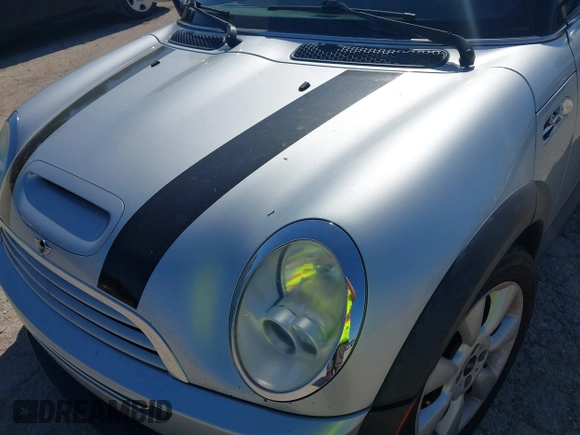 2006 MINI Convertible S with VIN WMWRH33596TK59633, listed as a IAAI auction lot 42242545 with 77,837 mi miles and . Bid and sale history available at DreamBid. Image 6.