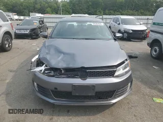 2014 Volkswagen Jetta GLI with VIN 3VW4T7AJ3EM352712, listed as a Copart auction lot 59582825 with 145,765 mi miles and Salvage title. Bid and sale history available at DreamBid. Image 5.