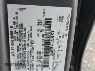 2013 Ford Fusion Titanium Hybrid with VIN 3FA6P0RU7DR326224, listed as a Copart auction lot 61597825 with 256,880 mi miles and Salvage title. Bid and sale history available at DreamBid. Image 12.