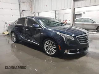 2019 Cadillac XTS Luxury z VIN 2G61M5S35K9157970, wystawiony jako IAAI lot #41741907 z przebiegiem 82 795 mil mil oraz . Historia ofert i sprzedaży dostępna na DreamBid. Obrazek 1.