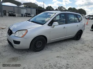 2009 Kia Rondo LX Base with VIN KNAFG528897229906, listed as a Copart auction lot 70821774 with 126,423 mi miles and Clean Title. Bid and sale history available at carsss.com. Image 1.