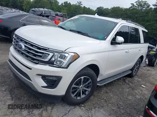 2018 Ford Expedition XLT with VIN 1FMJU1HT9JEA48285, listed as a IAAI auction lot 40282104 with 79,476 mi miles. Bid and sale history available at carsss.com. Image 2.