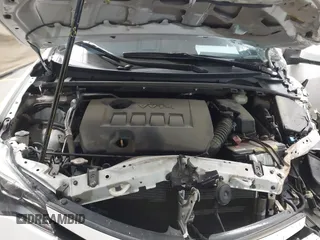 2017 Toyota Corolla L with VIN 5YFBURHE7HP693037, listed as a IAAI auction lot 42304020 with 117,710 mi miles and . Bid and sale history available at DreamBid. Image 10.