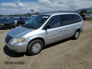 2007 Chrysler Town & Country LX with VIN 2A4GP44R17R258841, listed as a Copart auction lot 54401695 with 155,155 mi miles and Salvage Title. Bid and sale history available at DreamBid. Image 1.
