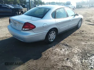 2005 Ford Taurus SE z VIN 1FAFP53U25A216523, wystawiony jako IAAI lot #42648554 z przebiegiem 175 042 mil mil oraz . Historia ofert i sprzedaży dostępna na DreamBid. Obrazek 4.