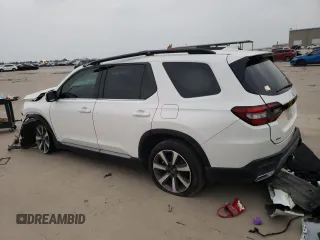2023 Honda Pilot Elite z VIN 5FNYG1H81PB045653, wystawiony jako Copart lot #51252065 z przebiegiem 57 388 mil mil oraz Szkoda całkowita • Salvage title. Historia ofert i sprzedaży dostępna na DreamBid. Obrazek 2.