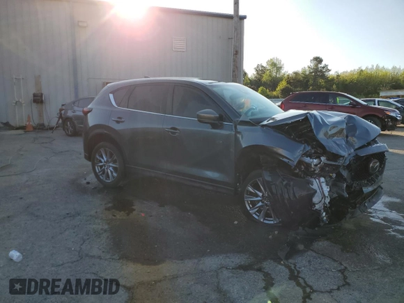 2019 Mazda CX-5 Grand Touring with VIN JM3KFBDM9K0676795, listed as a Copart auction lot 52129885 with 71,869 mi miles and Salvage Title. Bid and sale history available at carsss.com. Image 4.