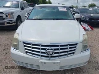 2006 Cadillac DTS 1SC z VIN 1G6KD57Y46U180755, wystawiony jako IAAI lot #42299416 z przebiegiem 109 532 mil mil oraz . Historia ofert i sprzedaży dostępna na DreamBid. Obrazek 13.