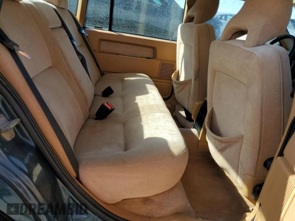 1994 Volvo 900 z VIN YV1JS8615R1180199, wystawiony jako Copart lot #76126714 z przebiegiem 131 713 mil mil oraz Szkoda całkowita • Salvage title. Historia ofert i sprzedaży dostępna na DreamBid. Obrazek 10.