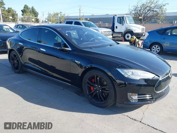 2014 Tesla Model S P85D with VIN 5YJSA1H22EFP65530, listed as a IAAI auction lot 41959941 with 76,532 mi miles and . Bid and sale history available at DreamBid. Image 1.