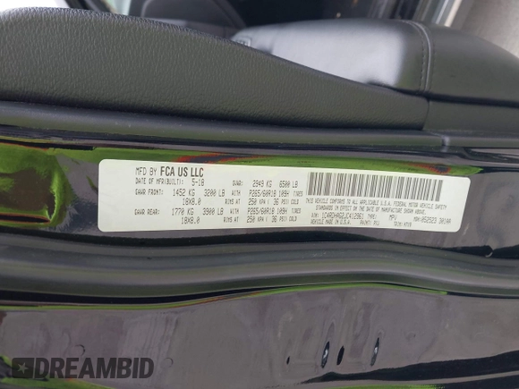 2018 Dodge Durango SXT with VIN 1C4RDHAG2JC412961, listed as a IAAI auction lot 42136418 with 100,477 mi miles and . Bid and sale history available at DreamBid. Image 9.