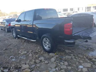 2014 Chevrolet Silverado 1500 LT with VIN 3GCPCREC0EG321309, listed as a IAAI auction lot 41411069 with 174,689 mi miles. Bid and sale history available at carsss.com. Image 3.