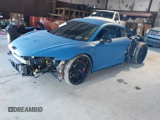 2023 Audi R8 performance quattro with VIN WUACEAFX5P7902124, listed as a IAAI auction lot 41426635 with 3,438 mi miles and . Bid and sale history available at DreamBid. Image 2.