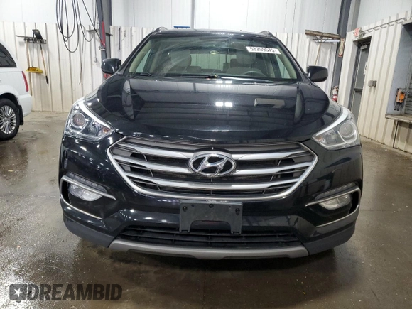 2017 Hyundai Santa Fe 2.4L z VIN 5NMZUDLB7HH027319, wystawiony jako Copart lot #58259575 z przebiegiem 114 812 mil mil oraz Szkoda całkowita • Salvage title. Historia ofert i sprzedaży dostępna na DreamBid. Obrazek 5.