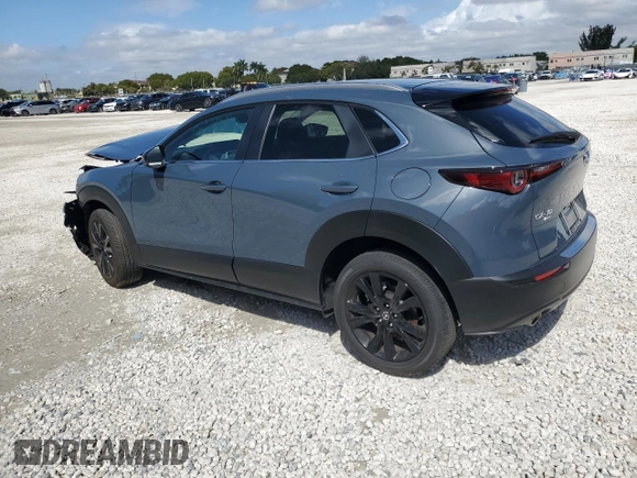 2024 Mazda CX-30 2.5 S Carbon Edition with VIN 3MVDMBCMXRM673483, listed as a Copart auction lot 46810935 with 3,047 mi miles and Salvage Title. Bid and sale history available at carsss.com. Image 2.