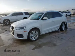 2016 Audi Q3 Premium Plus with VIN WA1BFCFS9GR016165, listed as a Copart auction lot 61865565 with 128,546 mi miles and Salvage title. Bid and sale history available at DreamBid. Image 1.