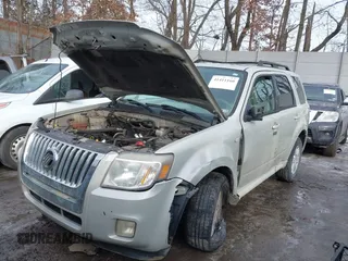 2009 Mercury Mariner z VIN 4M2CU91709KJ24606, wystawiony jako IAAI lot #41411160 z przebiegiem Nie podano mil oraz . Historia ofert i sprzedaży dostępna na DreamBid. Obrazek 6.
