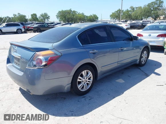 2011 Nissan Altima 2.5 S with VIN 1N4AL2AP6BN421591, listed as a IAAI auction lot 42122870 with 148,897 mi miles. Bid and sale history available at carsss.com. Image 4.