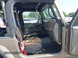 2005 Jeep Wrangler SE with VIN 1J4FA29S25P328827, listed as a IAAI auction lot 41917807 with 157,562 mi miles. Bid and sale history available at carsss.com. Image 5.