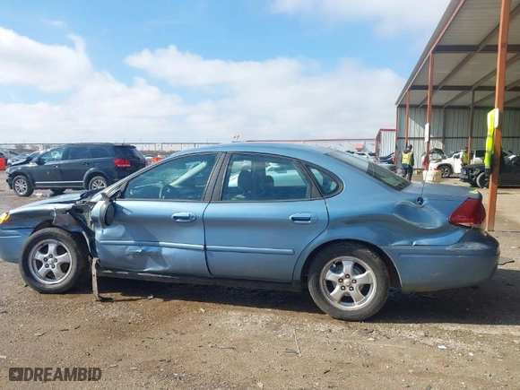 2005 Ford Taurus SE with VIN 1FAFP53U45A176669, listed as a IAAI auction lot 41357877 with 209392 miles. Bid and sale history available at carsss.com. Image 14.