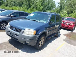 2001 Ford Escape XLT with VIN 1FMCU041X1KF10409, listed as a IAAI auction lot 39780383 with 246,336 mi miles. Bid and sale history available at carsss.com. Image 2.