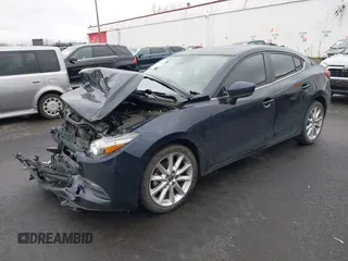 2017 Mazda 3 Touring with VIN 3MZBN1V72HM103660, listed as a IAAI auction lot 41588084 with 95,184 mi miles and . Bid and sale history available at DreamBid. Image 16.