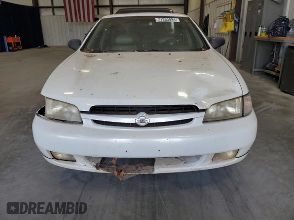1999 Nissan Altima XE with VIN 1N4DL01D5XC221408, listed as a Copart auction lot 71363084 with 207,485 mi miles and Salvage Title. Bid and sale history available at carsss.com. Image 5.
