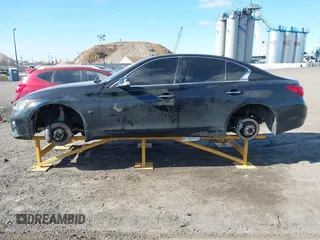 2015 Infiniti Q50 Premium with VIN JN1BV7AR6FM393586, listed as a IAAI auction lot 41683059 with 125,991 mi miles. Bid and sale history available at carsss.com. Image 14.
