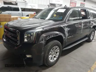 2018 GMC Yukon XL SLT Standard Edition with VIN 1GKS2JKCXJR376058, listed as a IAAI auction lot 41507544 with 110,299 mi miles. Bid and sale history available at carsss.com. Image 17.
