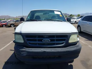 2003 Ford F-150 XL with VIN 2FTRF17W73CA77144, listed as a IAAI auction lot 42609120 with 102,490 mi miles and . Bid and sale history available at DreamBid. Image 12.