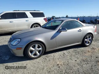 2003 Mercedes-Benz SLK 320 with VIN WDBKK65F23F291880, listed as a Copart auction lot 88149035 with 104,527 mi miles and Salvage title. Bid and sale history available at DreamBid. Image 1.