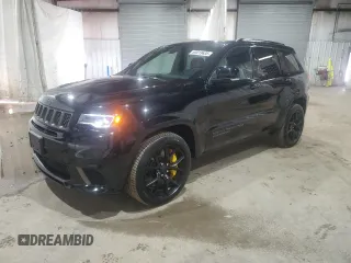 2018 Jeep Grand Cherokee Trackhawk with VIN 1C4RJFN90JC459012, listed as a Copart auction lot 65019635 with 9,096 mi miles and Salvage title. Bid and sale history available at DreamBid. Image 1.