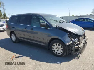 2010 Honda Odyssey LX with VIN 5FNRL3H29AB065521, listed as a Copart auction lot 45743455 with 128,389 mi miles and Salvage Title. Bid and sale history available at carsss.com. Image 4.