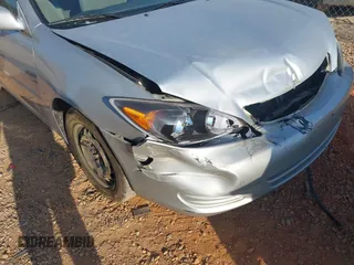 2003 Toyota Camry LE with VIN 4T1BE32KX3U224721, listed as a IAAI auction lot 42165503 with 277,466 mi miles and . Bid and sale history available at DreamBid. Image 13.