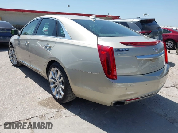 2016 Cadillac XTS Luxury Collection with VIN 2G61M5S31G9146455, listed as a IAAI auction lot 42019234 with 72,019 mi miles. Bid and sale history available at carsss.com. Image 3.