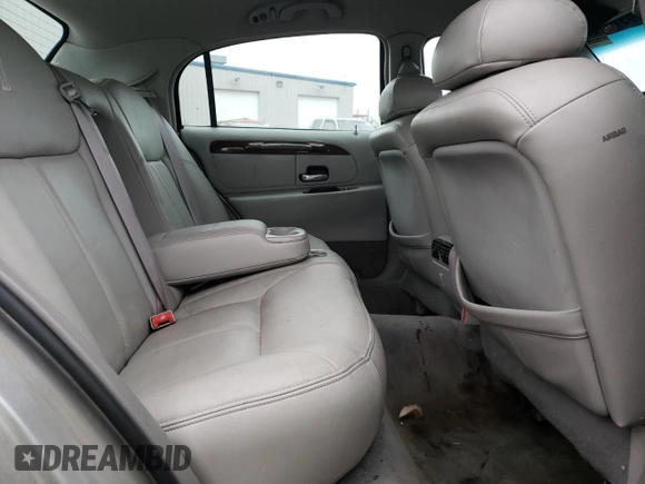 2001 Lincoln Town Car Cartier z VIN 1LNHM83W81Y629753, wystawiony jako Copart lot #36916024 z przebiegiem 150 875 mil mil oraz Szkoda całkowita • Salvage title. Historia ofert i sprzedaży dostępna na DreamBid. Obrazek 10.