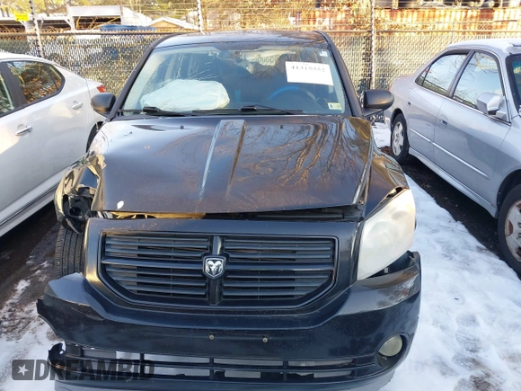 2009 Dodge Caliber SXT with VIN 1B3HB48A89D118869, listed as a IAAI auction lot 41315552 with 198,986 mi miles and . Bid and sale history available at DreamBid. Image 12.