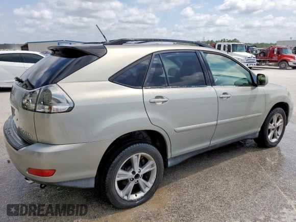 2006 Lexus RX 400h with VIN JTJGW31U260004024, listed as a Copart auction lot 57281205 with 166,426 mi miles and Clean title. Bid and sale history available at DreamBid. Image 3.