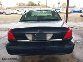 2001 Ford Crown Victoria Police Pkg Police Interceptor with VIN 2FAFP71WX1X127347, listed as a IAAI auction lot 41134745 with 161,180 mi miles. Bid and sale history available at carsss.com. Image 16.