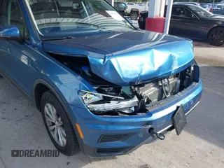 2018 Volkswagen Tiguan S с VIN 3VV1B7AX4JM059717, выставлен на аукционе IAAI как лот 40844600 с пробегом 32 540 миль миль и . История ставок и продаж доступна на DreamBid. Изображение 6.