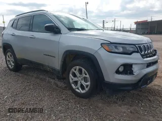 2024 Jeep Compass Latitude with VIN 3C4NJDBN9RT118616, listed as a IAAI auction lot 42030101 with 34,073 mi miles. Bid and sale history available at carsss.com. Image 1.