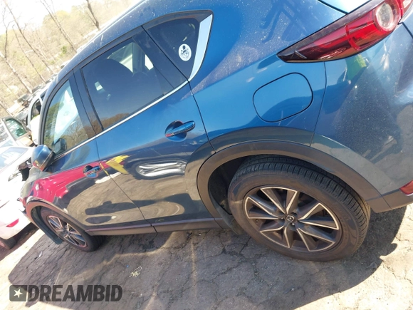 2017 Mazda CX-5 Grand Touring with VIN JM3KFADL8H0105518, listed as a IAAI auction lot 41876779 with 82,540 mi miles. Bid and sale history available at carsss.com. Image 14.