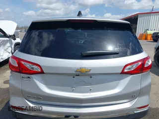 2021 Chevrolet Equinox LT with VIN 2GNAXKEV3M6129404, listed as a IAAI auction lot 41779923 with 113,615 mi miles and . Bid and sale history available at DreamBid. Image 16.