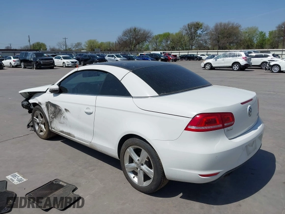 2012 Volkswagen Eos Executive with VIN WVWFW7AH9CV022169, listed as a IAAI auction lot 41795571 with 101,375 mi miles and . Bid and sale history available at DreamBid. Image 3.