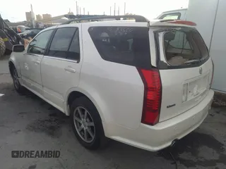 2004 Cadillac SRX with VIN 1GYEE63A040146994, listed as a IAAI auction lot 35501334 with 206,073 mi miles. Bid and sale history available at carsss.com. Image 3.