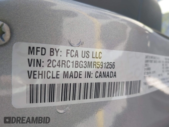 2021 Chrysler Pacifica Touring L with VIN 2C4RC1BG3MR591256, listed as a IAAI auction lot 42062406 with 58,117 mi miles and . Bid and sale history available at DreamBid. Image 9.