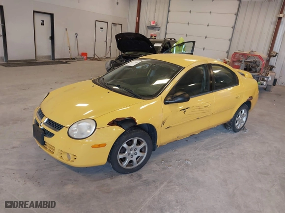 2004 Dodge Neon SXT with VIN 1B3ES56C14D621133, listed as a IAAI auction lot 42095446 with 147,120 mi miles. Bid and sale history available at carsss.com. Image 2.